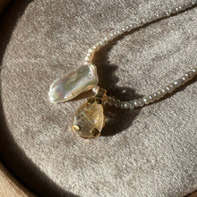 Load image into Gallery viewer, Touchstone Pendant Necklace: Pearl and 18k gold plated chain with golden rutilated quartz pendant