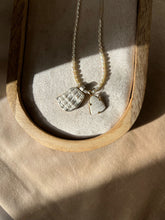 Load image into Gallery viewer, Touchstone Pendant Necklace: Pearl and silver plated chain with white shell pendants