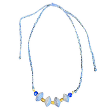 Load image into Gallery viewer, Necklace: recycled blue glass beads, brass beads, lapis on woven nylon thread
