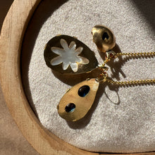 Load image into Gallery viewer, Touchstone Pendant Necklace: 18k gold plated chain with mother of pearl, shell, and bronze rattle pendants