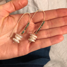 Load image into Gallery viewer, Long hook earrings with white pearl discs and turquoise beads.
