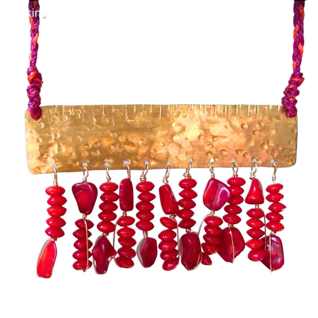 Measure Necklace: Brass ruler adorned with tassels of red coral beads