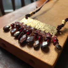 Load image into Gallery viewer, Measure Necklace: Brass ruler adorned with tassels of garnet, quartz and tigers eye stones
