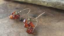 Load and play video in Gallery viewer, Earrings: Glass half full style in gold fill wire with amber and carnelian beads
